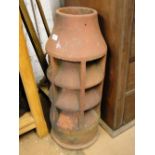 A terracotta chimney pot.