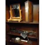 A carved oak barometer, bellows, companion set, swing toilet mirror and a candle box.