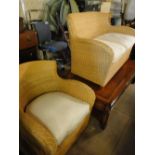 A wicker 2-seater sofa and matching armchair.