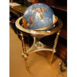 A hardstone terrestrial globe on stand.