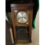 Art Deco oak cased wall clock.