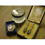 A small silver topped toilet jar, a silver fob and a pair of silver Art Deco pendant earrings.