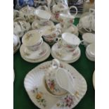 A Royal Doulton "Arcadia" teaset for 10-people including teapot.