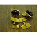 A pair of 9ct gold cufflinks, 7.8g, and a pair of 9ct gold cufflinks set with cabochon stones, 11.
