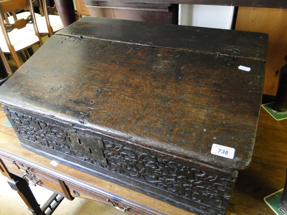 A 17/18th century carved oak bible box.