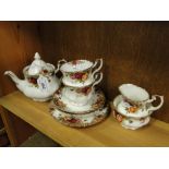 Royal Albert "Old Country Roses" teapot, 2 cups and saucers, milk jug and sugar bowl.