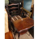 A mahogany foldover card table and a ladder back elbow chair.