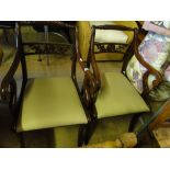 Pair of Regency style mahogany elbow chairs.