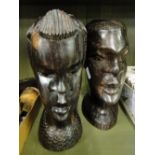 Pair of African carved ebony heads.