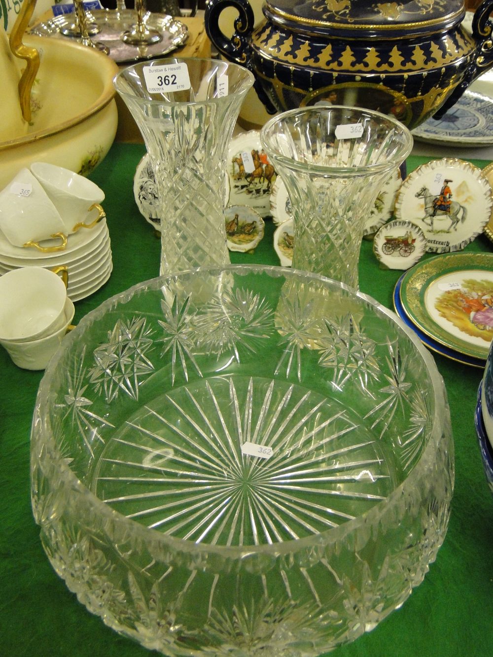 A large crystal fruit bowl and 2 cut-glass vases.