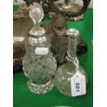 2 cut-glass and silver mounted scent bottles.