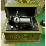 An Edison standard phonograph, original oak case circa 1900 (no horn).