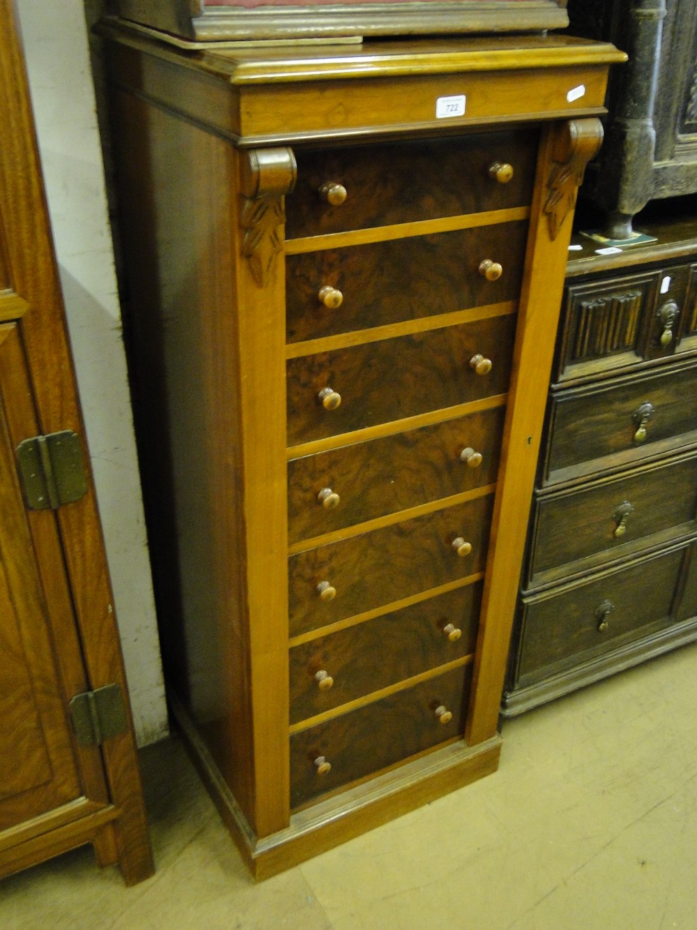 A reproduction mahogany secretaire Wellington chest.