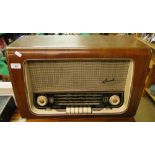 A Bush walnut cased valve radio.