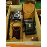 Leather cased Walzflex camera, a Zeiss Ikon camera, etc.