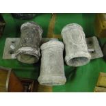 Three antique lead pipe joints with moulded designs