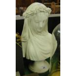 A bust of a veiled lady