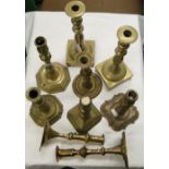 2 pairs of 19th century brass candlesticks and 5 single candlesticks.