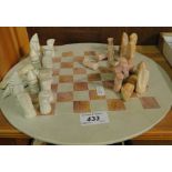 Carved soapstone chess set.