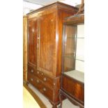 A 19th century mahogany linen press.