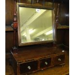 A 19th century mahogany box swing toilet mirror, with 3 fitted drawers on bracket feet.