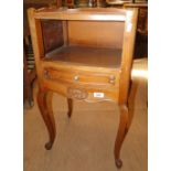 A French bow front bedside cabinet with single drawer.