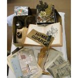 A box of Second World War memorabilia.