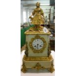Continental mantel clock with ormolu mounts surmounted by a figure.