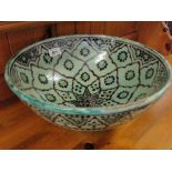A Middle Eastern large painted bowl.