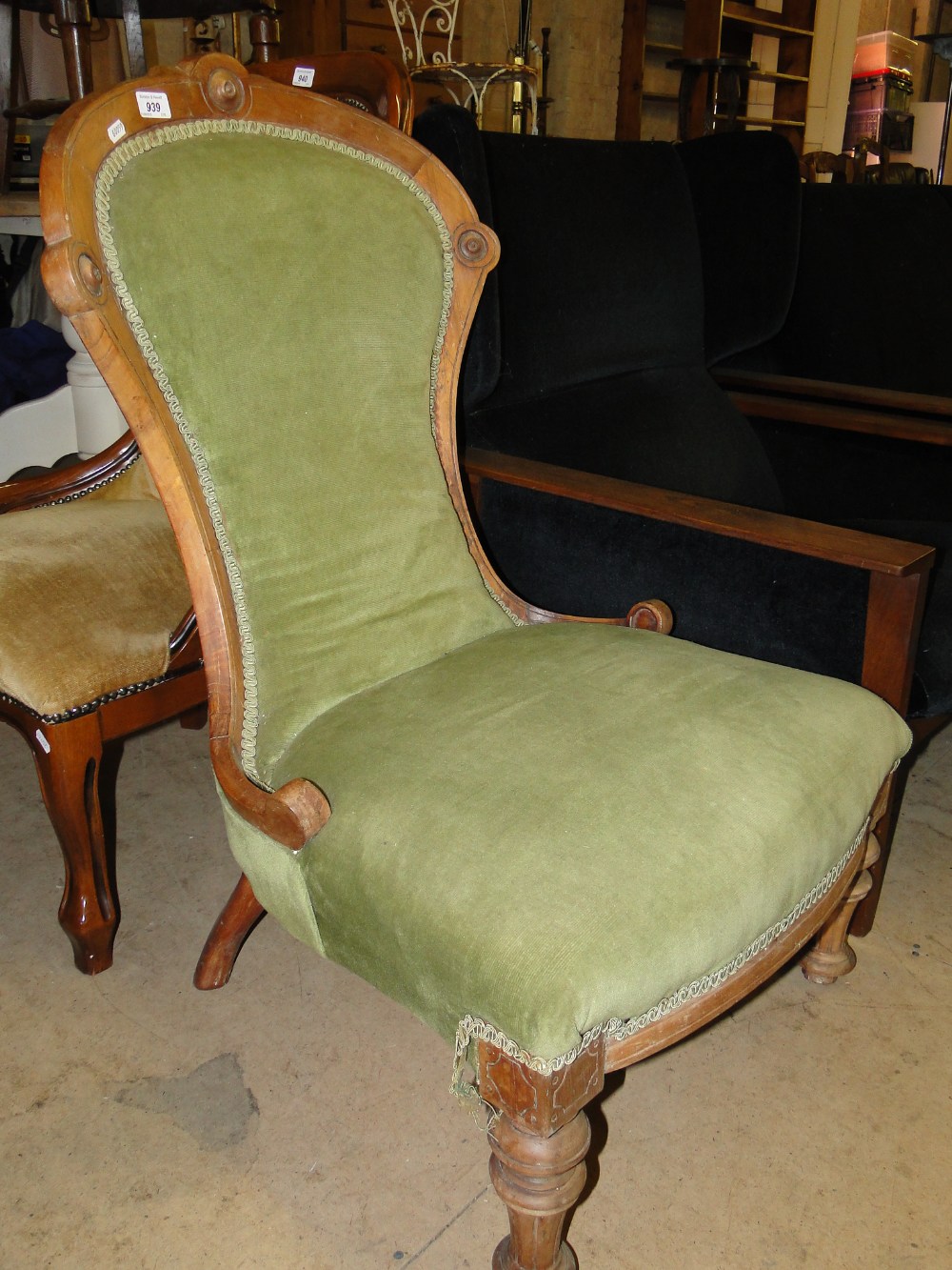 A Victorian walnut nursing chair