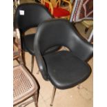 Pair of Eero Saarinen style executive chairs in black leather