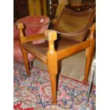 A Shikari teak & leather chair by Mufti,