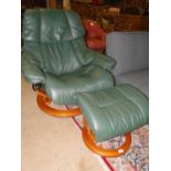 An Ekornes Stressless green leather reclining/swivel armchair & matching footstool