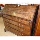 A George III mahogany bureau with fitted interior, 4 graduated drawers,