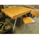 An extending cherrywood dining table with tambour top,