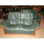 Pair of Ekornes Stressless green leather reclining 2 seater settees,