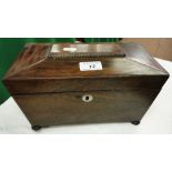 A Victorian rosewood tea caddy.