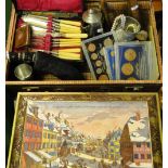 A suitcase with a bugle, Commemorative medals, cutlery, etc., and a large tin.