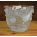 A Lalique opalescent moulded glass pot with design of birds and fruit.