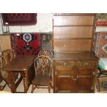 An oak drop leaf table,