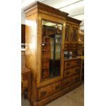 A Victorian crossbanded ash Beaconsfield wardrobe