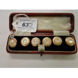 Cased set of 6 mother of pearl & gilt metal studs