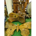 Carved wood butterfly, and 2 abstract root carvings.