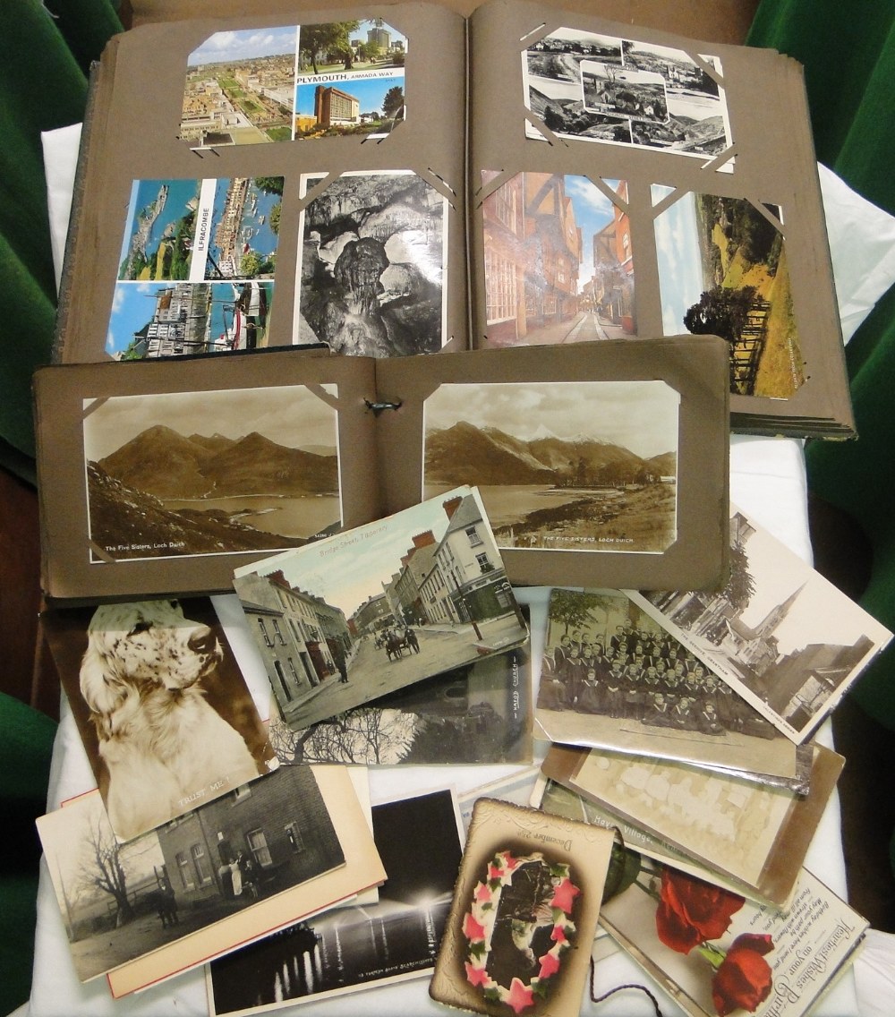 2 albums of topographical postcards, and loose cards.