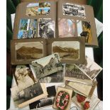 2 albums of topographical postcards, and loose cards.