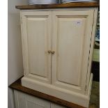 A painted pine 2-door cabinet.