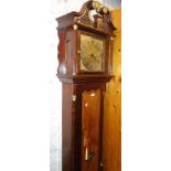 An 18th century 8-day long case clock, having an 11" square brass dial with subsidiary dial,