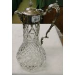 A Glass claret jug with plated mount & a silver 2 branch candelabrum