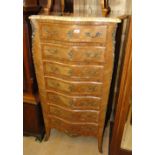 A French kingwood & walnut crossbanded serpentine front chest, having a shaped marble top,