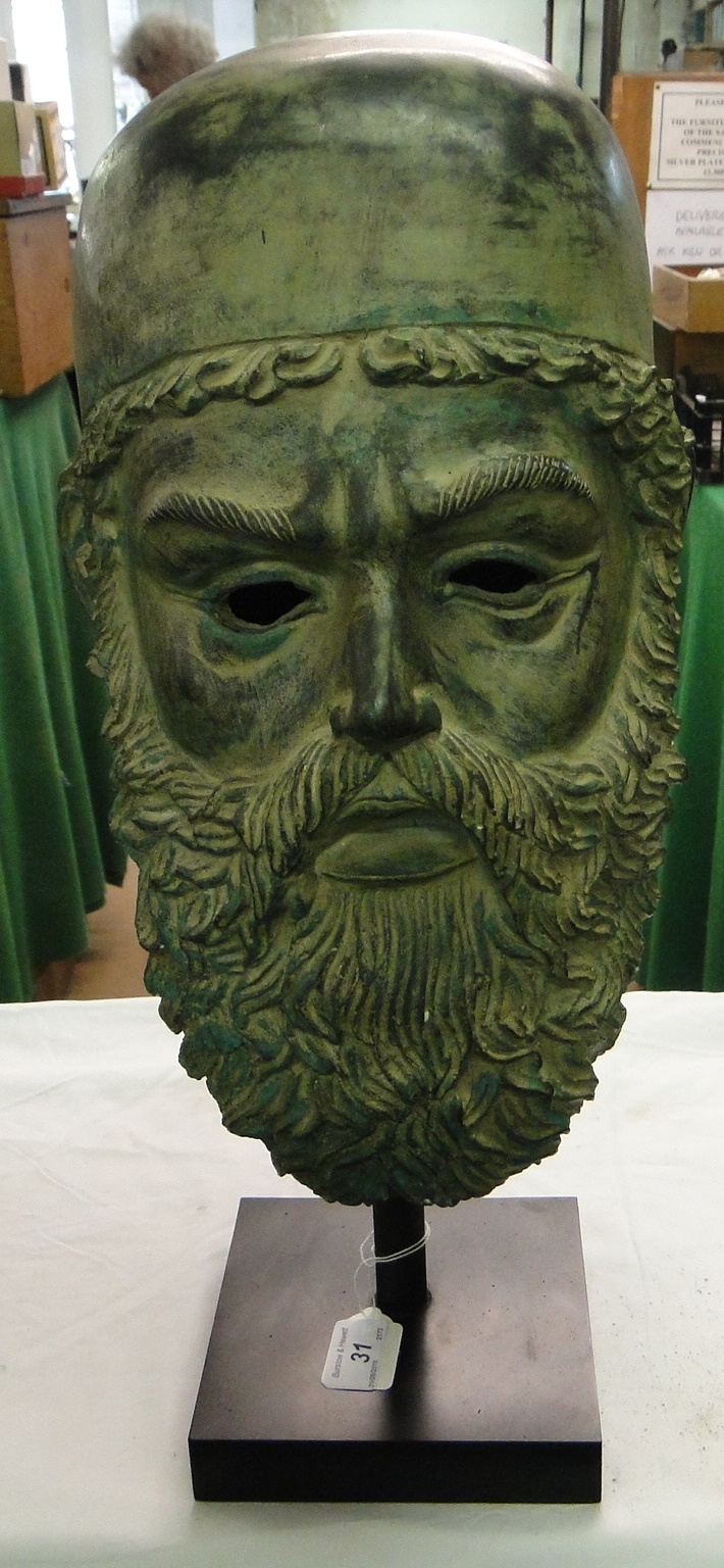 Verdigris metal study of a bearded man.